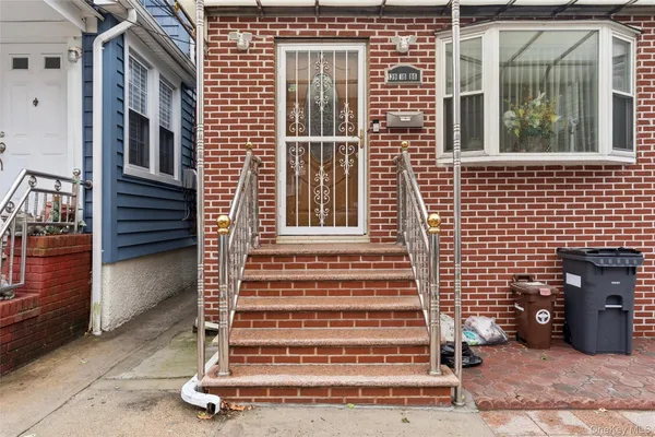 a view of a house with a door and a window