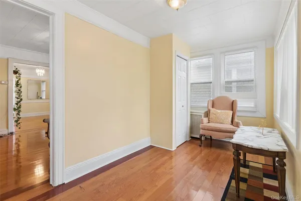 a room with furniture and wooden floor