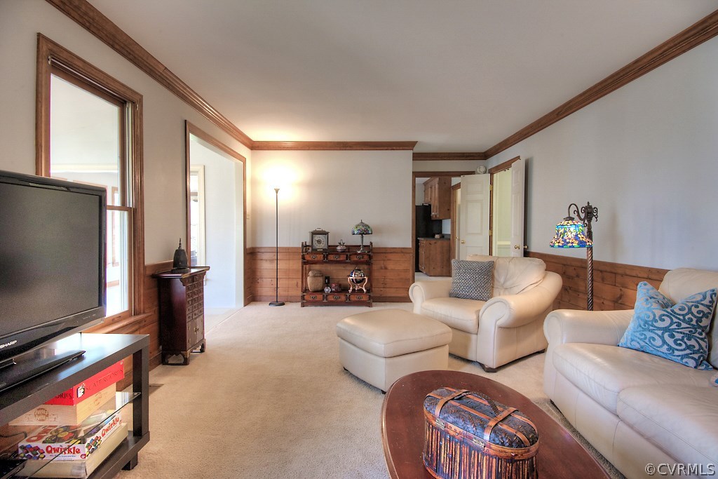 4602 Twin Cedars Road Chester, VA 23831 - Photo 17 of 47 a living room with furniture and a flat screen tv