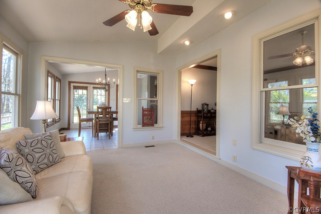 4602 Twin Cedars Road Chester, VA 23831 - Photo 21 of 47 a living room with furniture and a chandelier