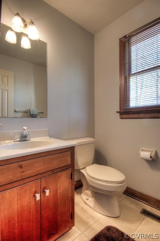 4602 Twin Cedars Road Chester, VA 23831 - Photo 23 of 47 a bathroom with a sink and a toilet