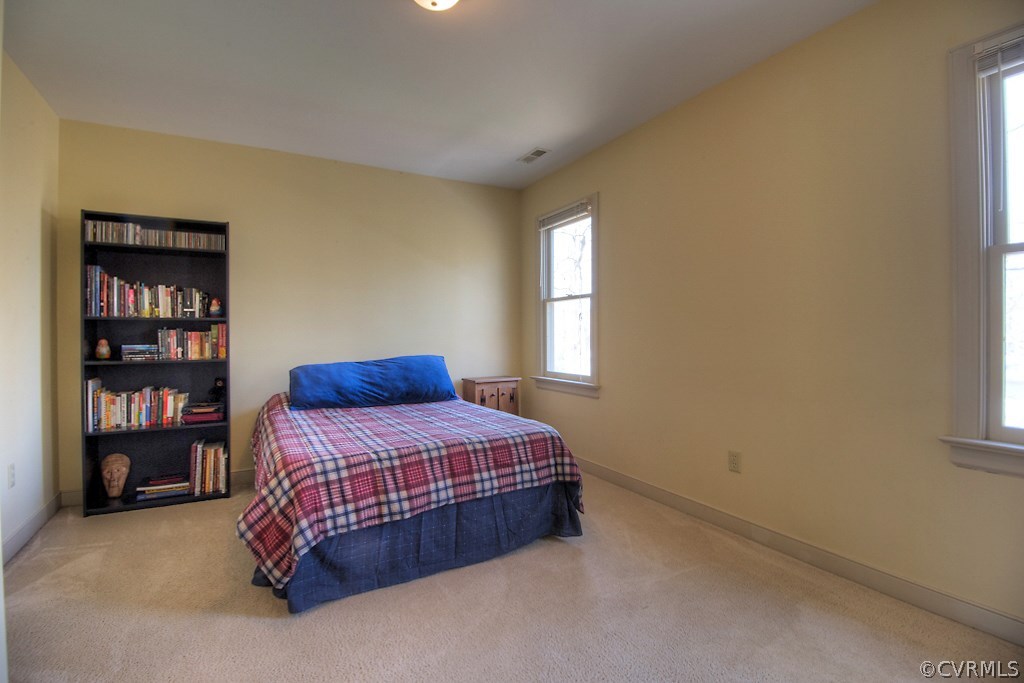 4602 Twin Cedars Road Chester, VA 23831 - Photo 32 of 47 a bedroom with a bed and closet