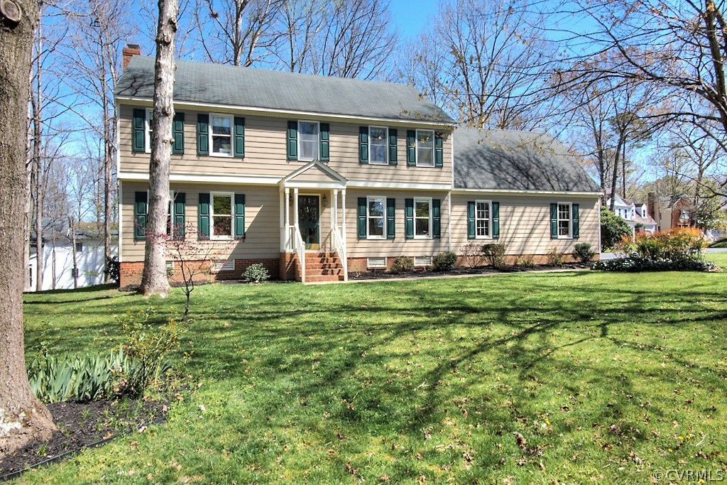 4602 Twin Cedars Road Chester, VA 23831 - Photo 44 of 47 front view of a house with a yard