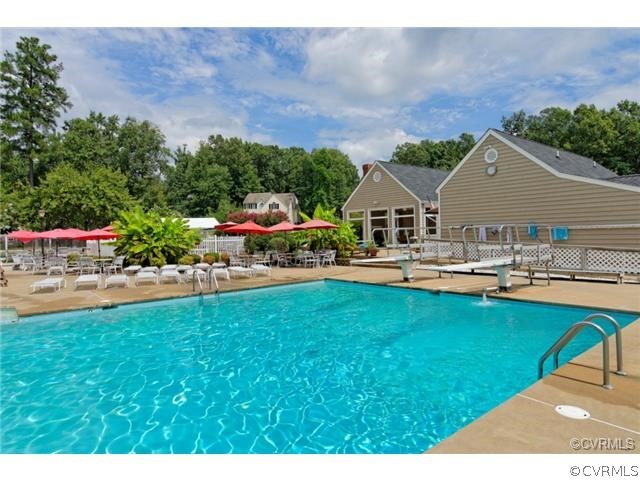 4602 Twin Cedars Road Chester, VA 23831 - Photo 47 of 47 a swimming pool with outdoor seating and yard