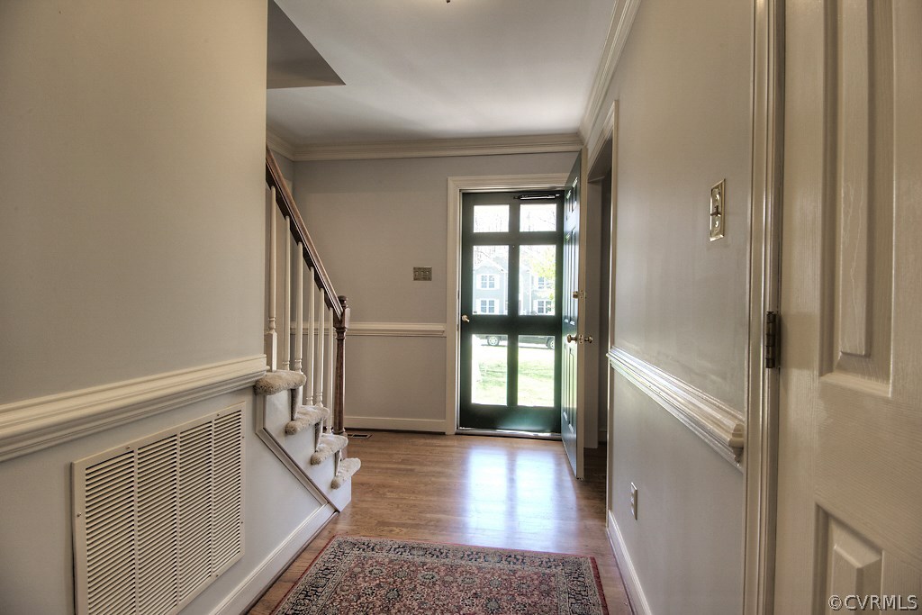 4602 Twin Cedars Road Chester, VA 23831 - Photo 6 of 47 a view of entryway with stairs and wooden floor