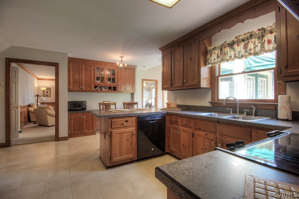 4602 Twin Cedars Road Chester, VA 23831 - Photo 10 of 47 a kitchen with stainless steel appliances granite countertop a sink stove and cabinets