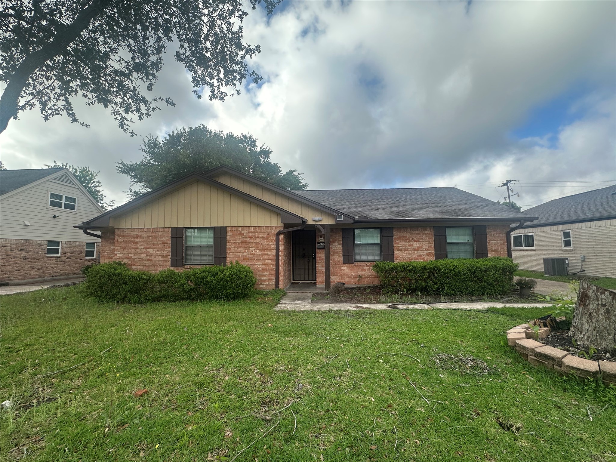 8519 Leader Street Houston, TX 77036 - Photo 1 of 27 a front view of a house with a yard and garage