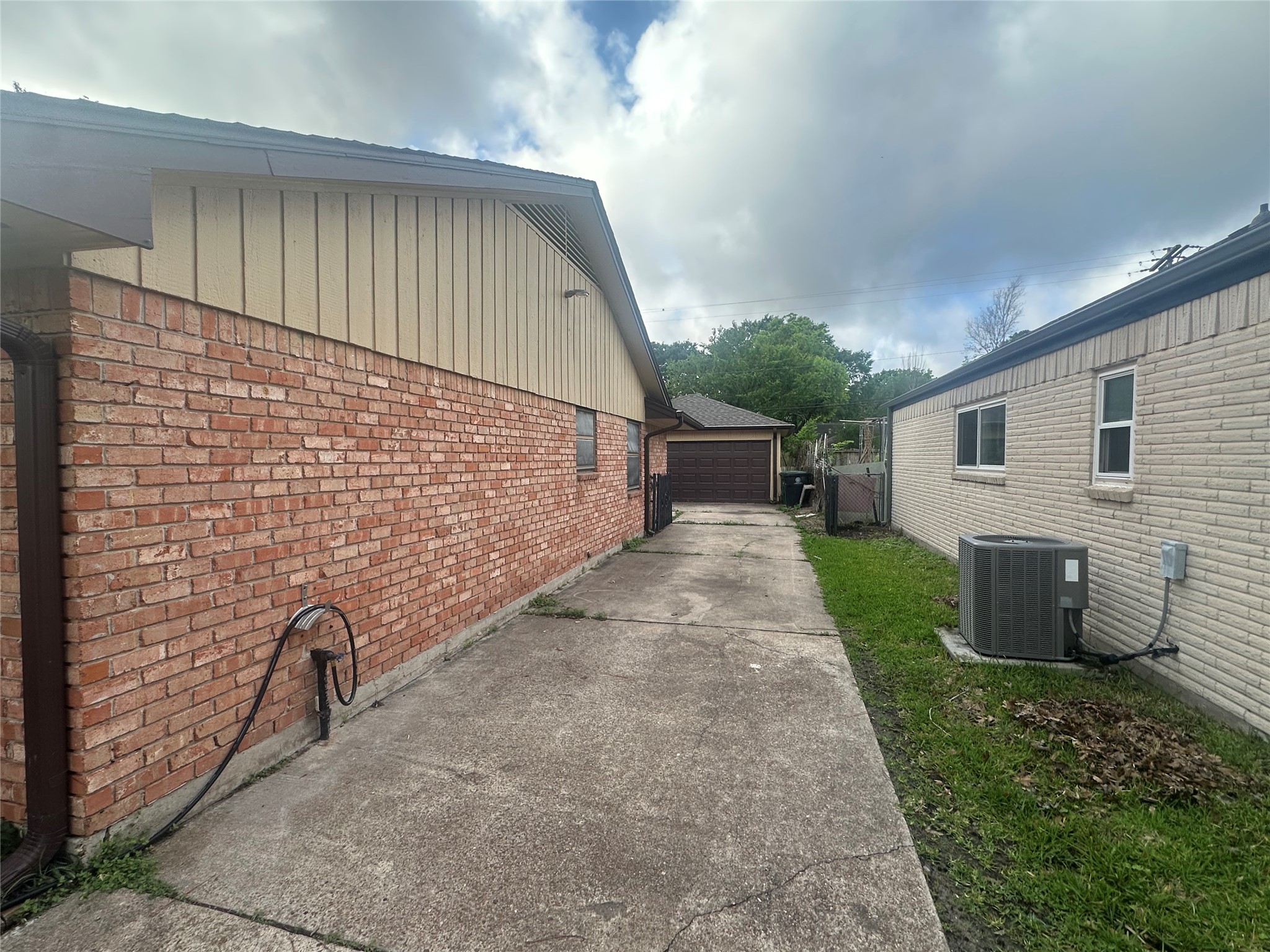 8519 Leader Street Houston, TX 77036 - Photo 25 of 27 a view of house with backyard and garden