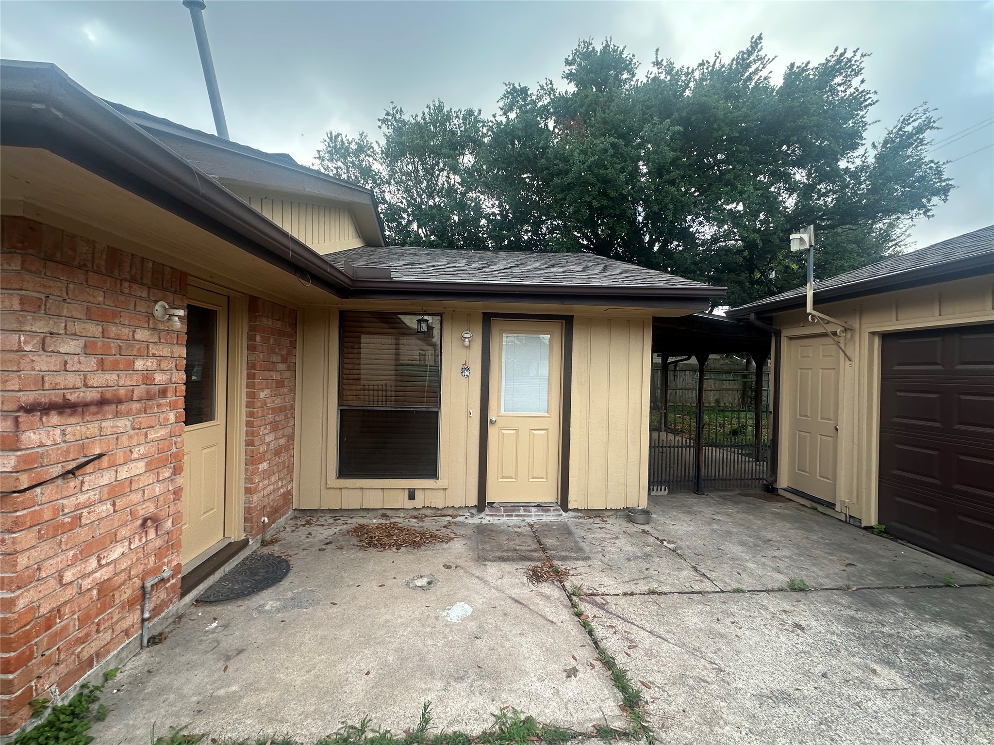 8519 Leader Street Houston, TX 77036 - Photo 26 of 27 a front view of a house with a garage