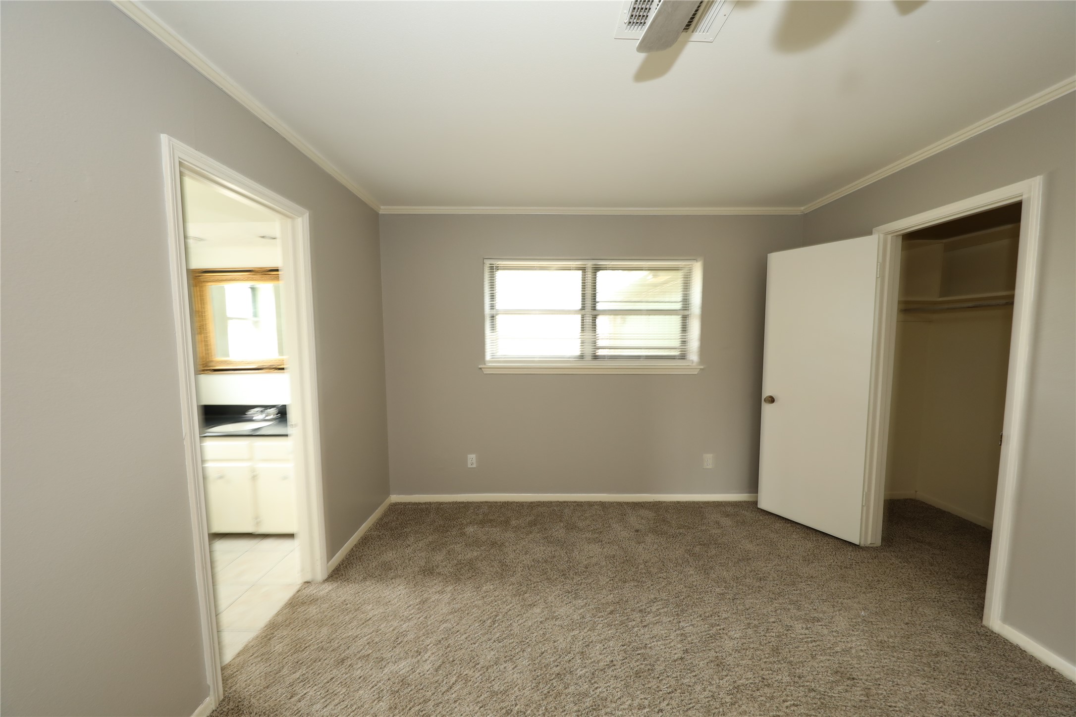 8519 Leader Street Houston, TX 77036 - Photo 7 of 27 an empty room with windows