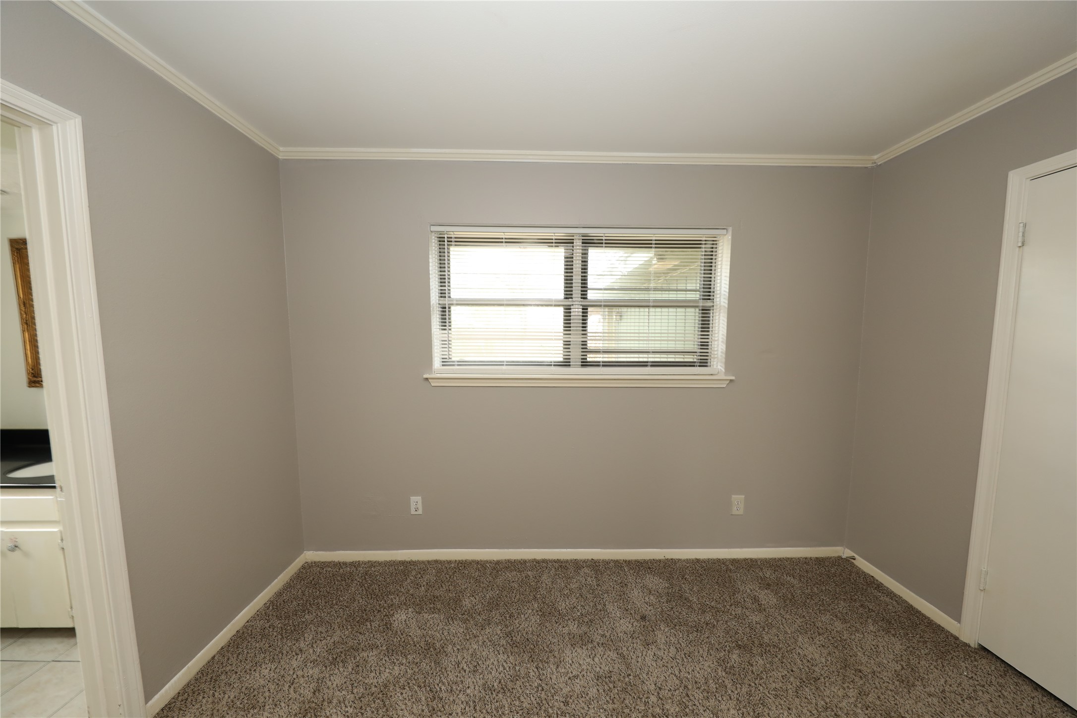 8519 Leader Street Houston, TX 77036 - Photo 9 of 27 an empty room with windows