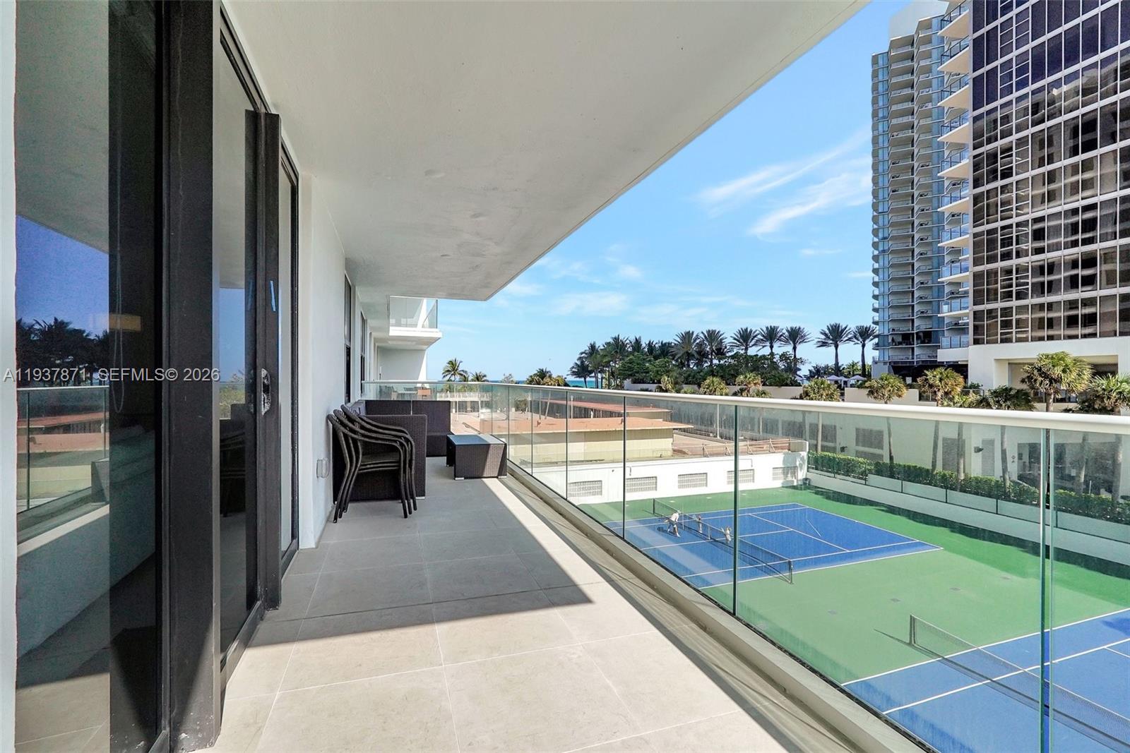 9801 Collins Avenue, Unit 5S Bal Harbour, FL 33154 - Photo 54 of 57 a view of balcony with couch