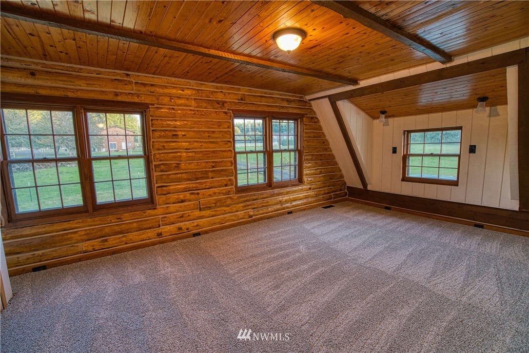 183 # 12 Spooner Road Chehalis, WA 98532 - Photo 8 of 21 a view of an empty room with a window