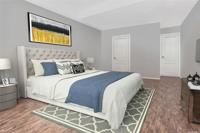 a bedroom with a bed and couch