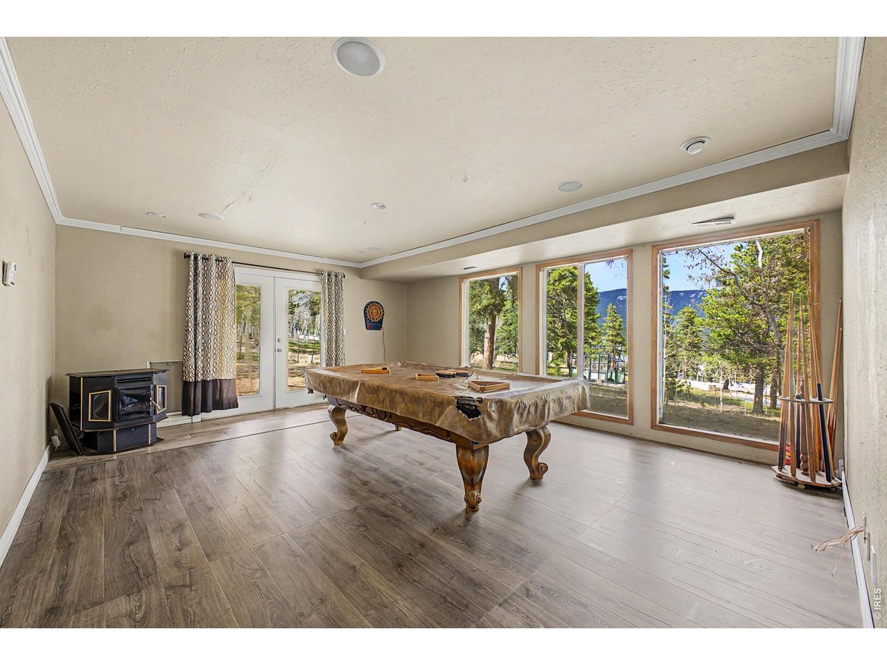 76 Highlands Drive Bailey, CO 80421 - Photo 20 of 49 a living room with furniture and wooden floor