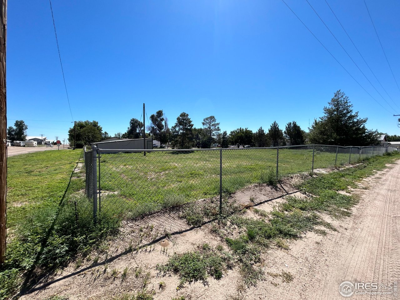 207 Dickson Street Wiggins, CO 80654 - Photo 8 of 9 a view of a park