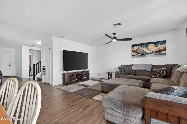 a living room with furniture and a window