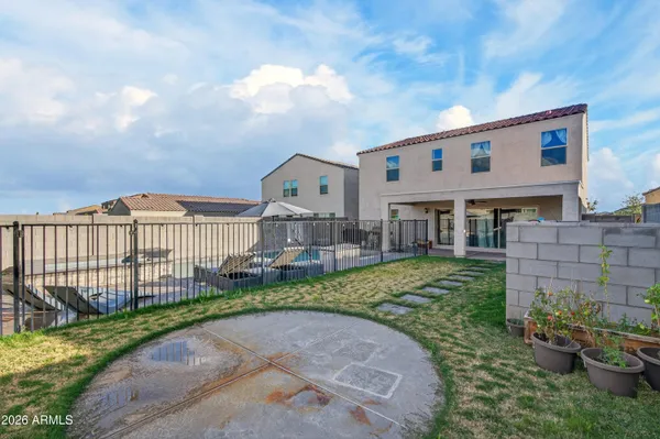 a view of a swimming pool with a patio