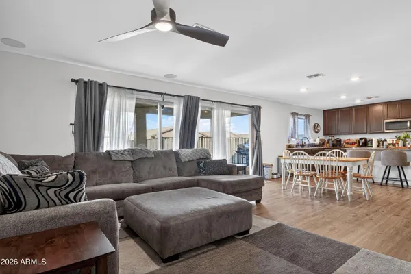 a living room with furniture and a window