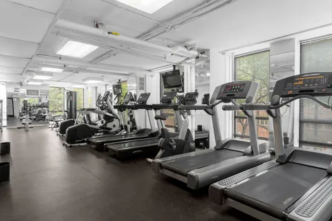 a view of a room with gym equipment