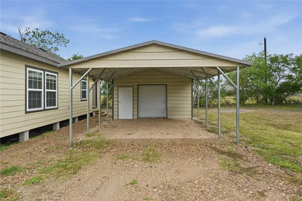 a view of a house with a porch
