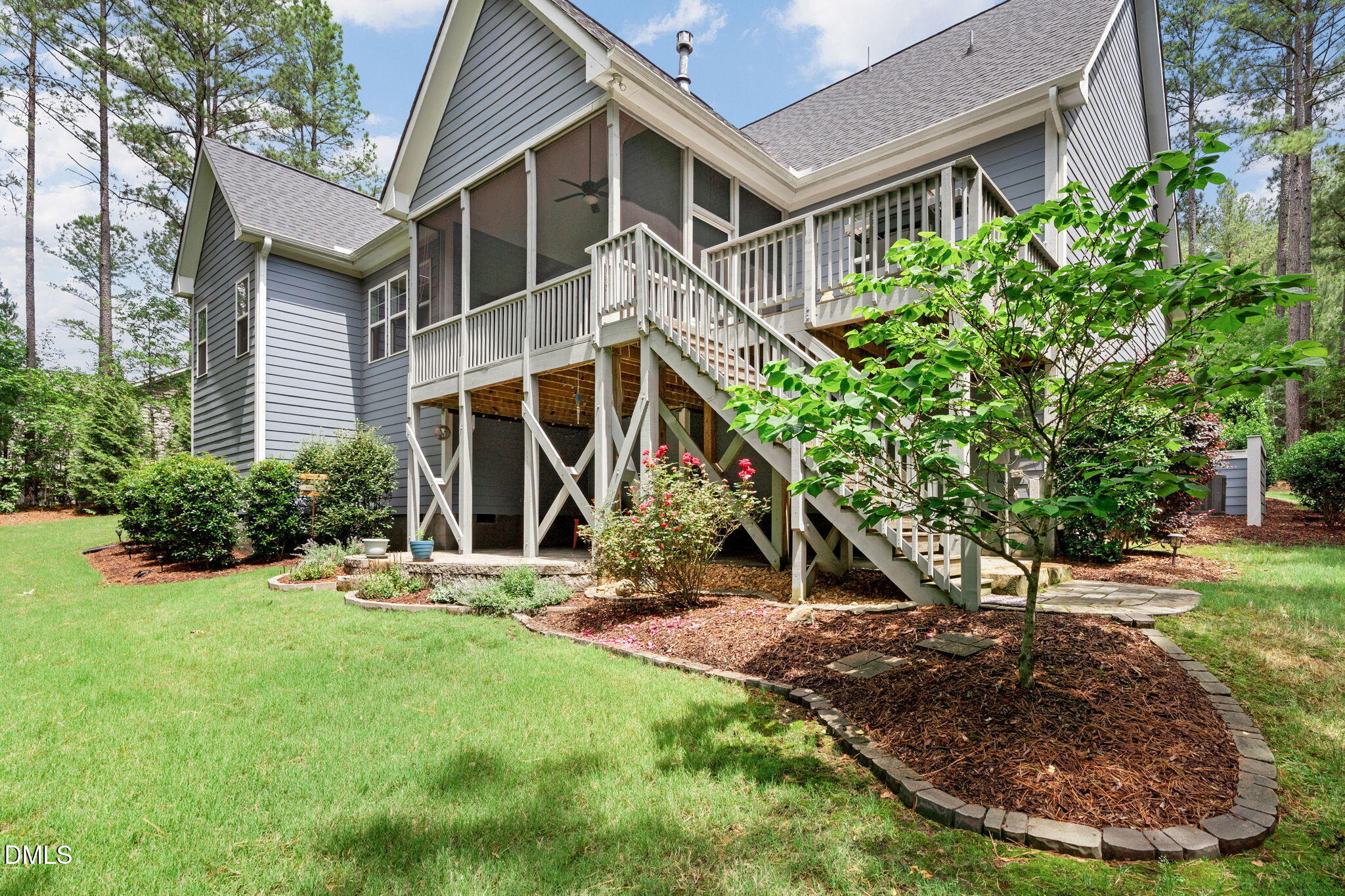 223 Colonial Ridge Drive Pittsboro, NC 27312 - Photo 35 of 47 a view of a house with backyard and garden
