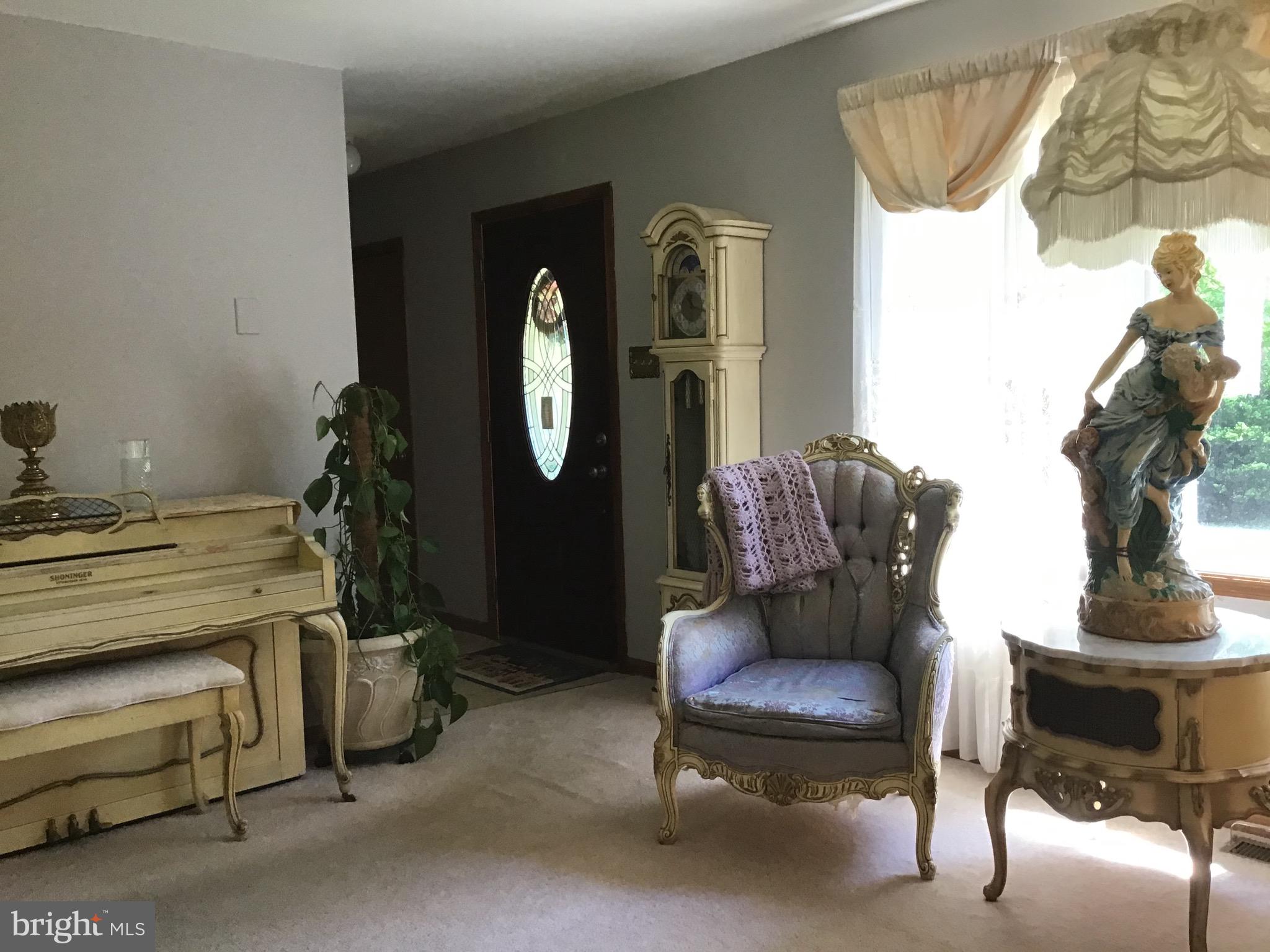 1503 Marshall Mill Road Franklinville, NJ 08322 - Photo 15 of 34 a living room with furniture and a mirror
