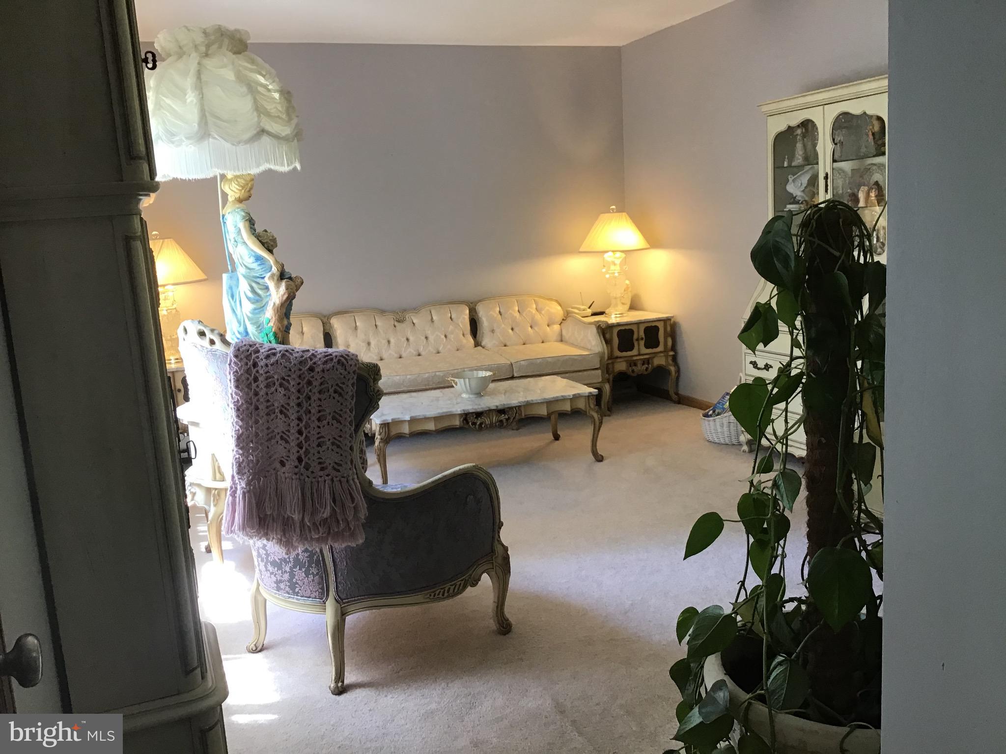 1503 Marshall Mill Road Franklinville, NJ 08322 - Photo 16 of 34 a living room with furniture and a chandelier