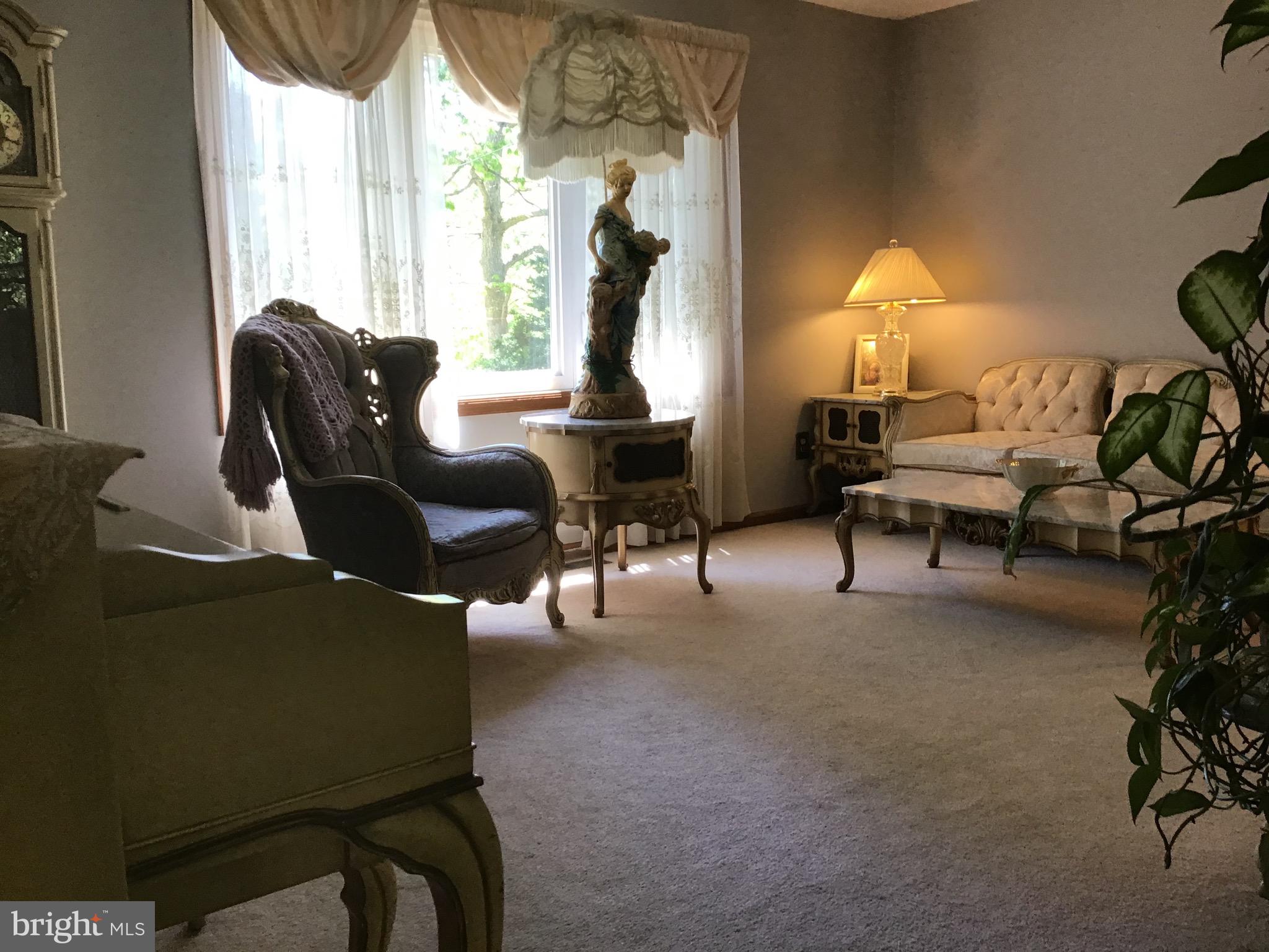 1503 Marshall Mill Road Franklinville, NJ 08322 - Photo 17 of 34 a living room with furniture a window and a fireplace