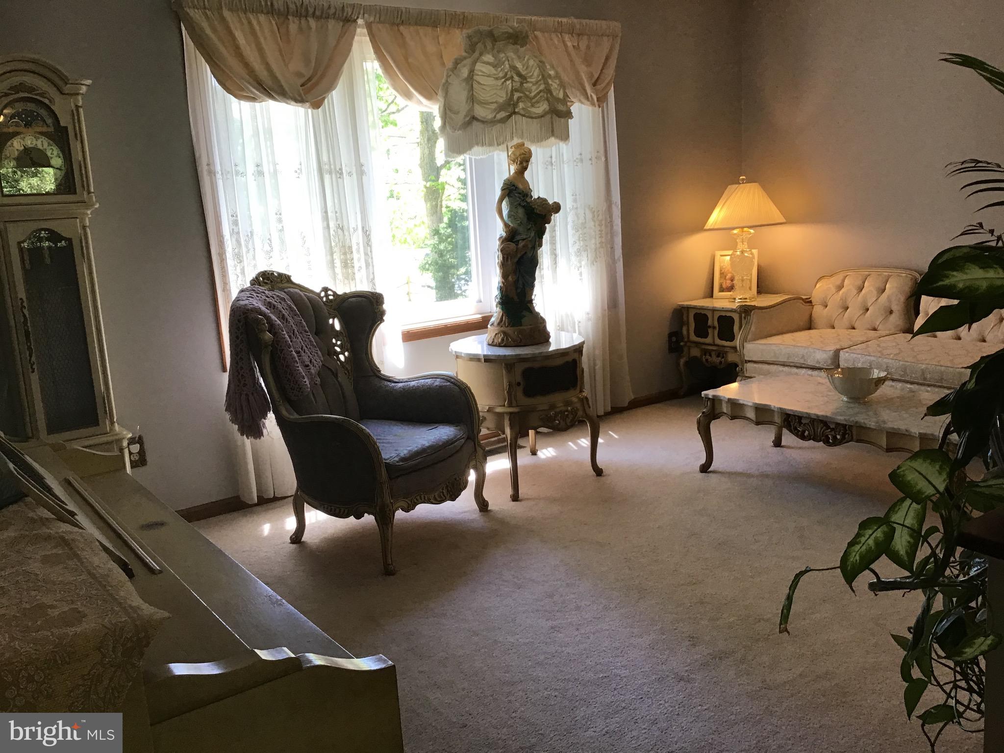 1503 Marshall Mill Road Franklinville, NJ 08322 - Photo 18 of 34 a living room with furniture a window and a flat screen tv