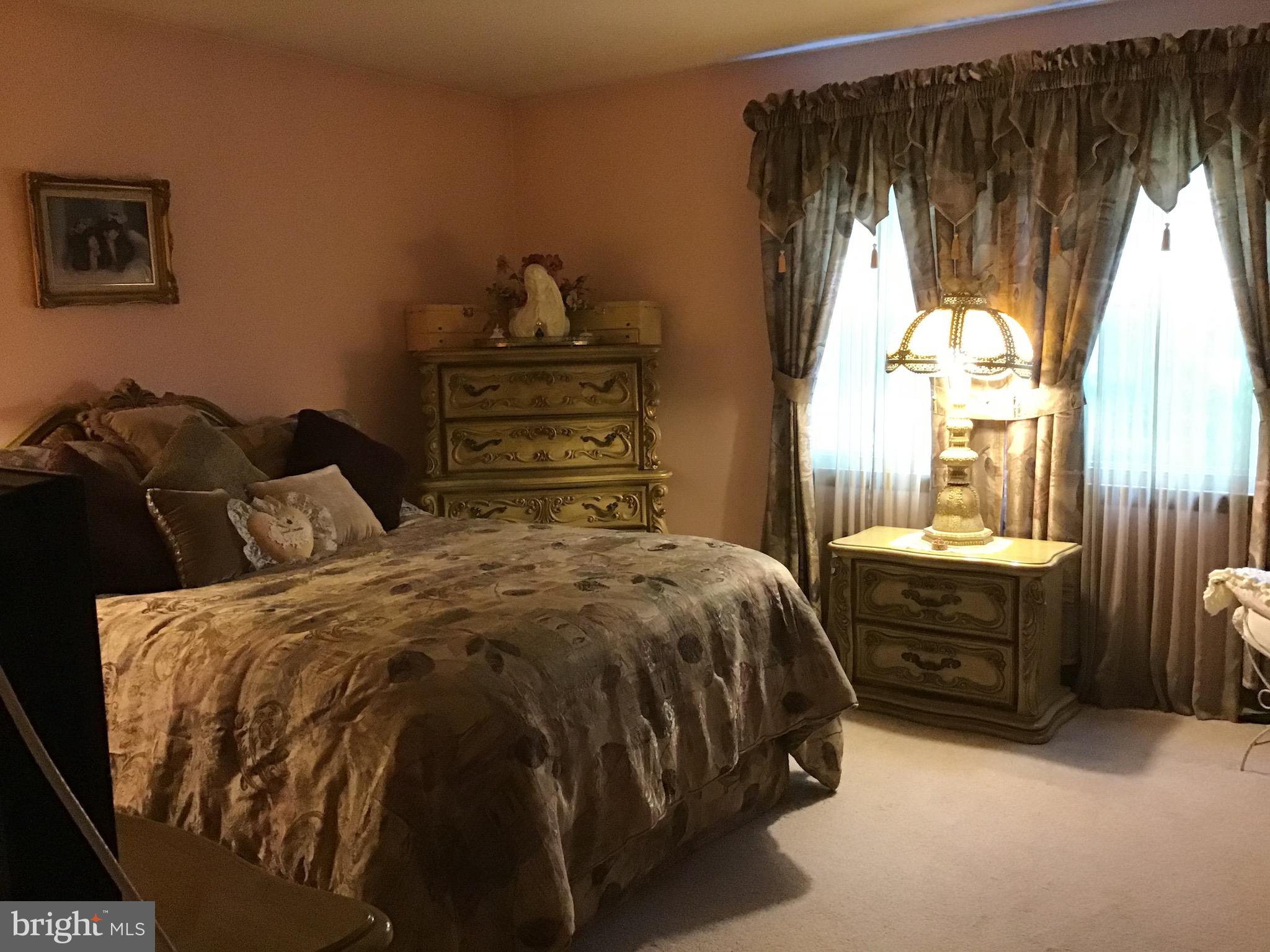 1503 Marshall Mill Road Franklinville, NJ 08322 - Photo 20 of 34 a bedroom with a bed and a window