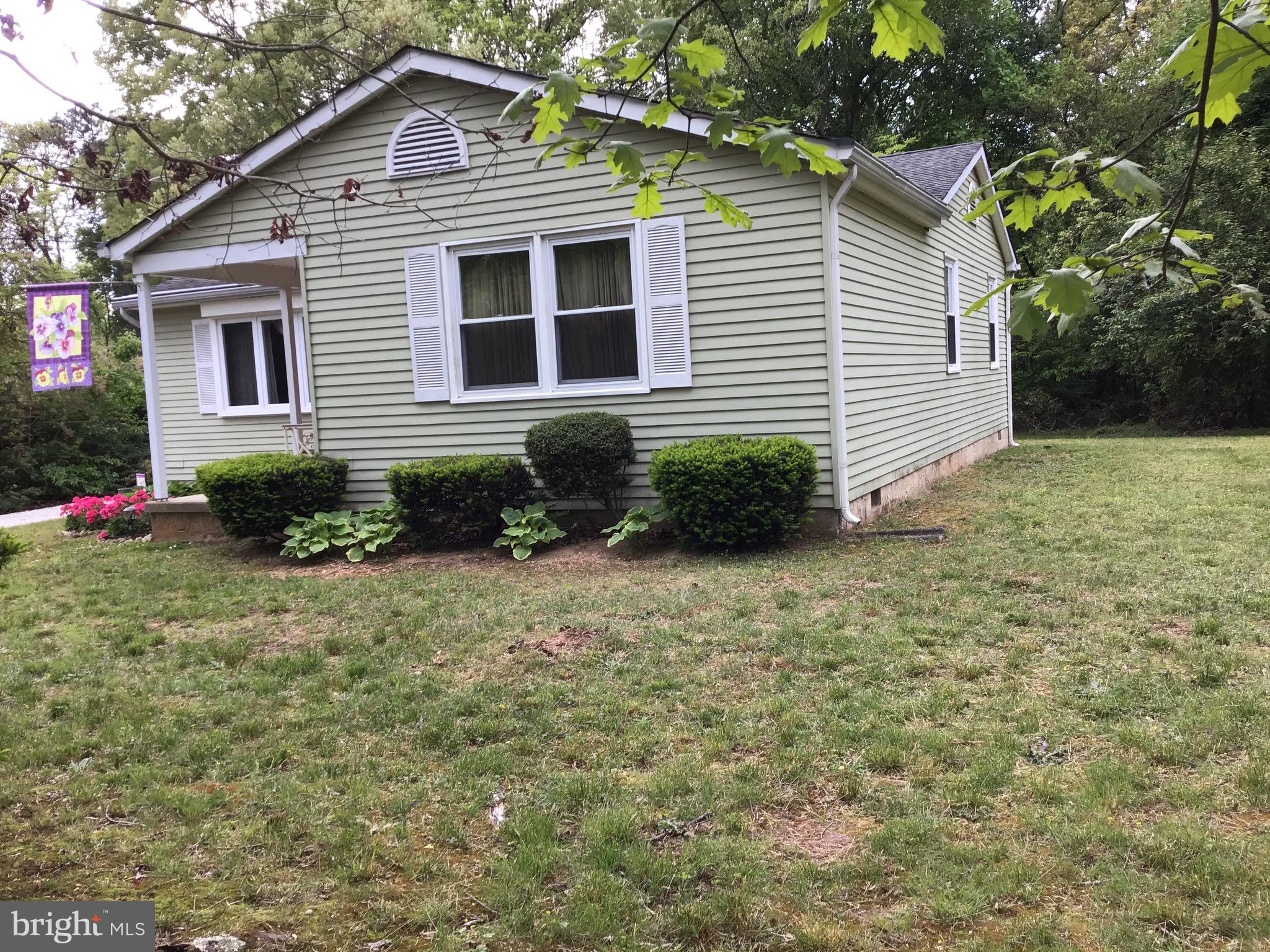 1503 Marshall Mill Road Franklinville, NJ 08322 - Photo 3 of 34 a front view of a house with garden