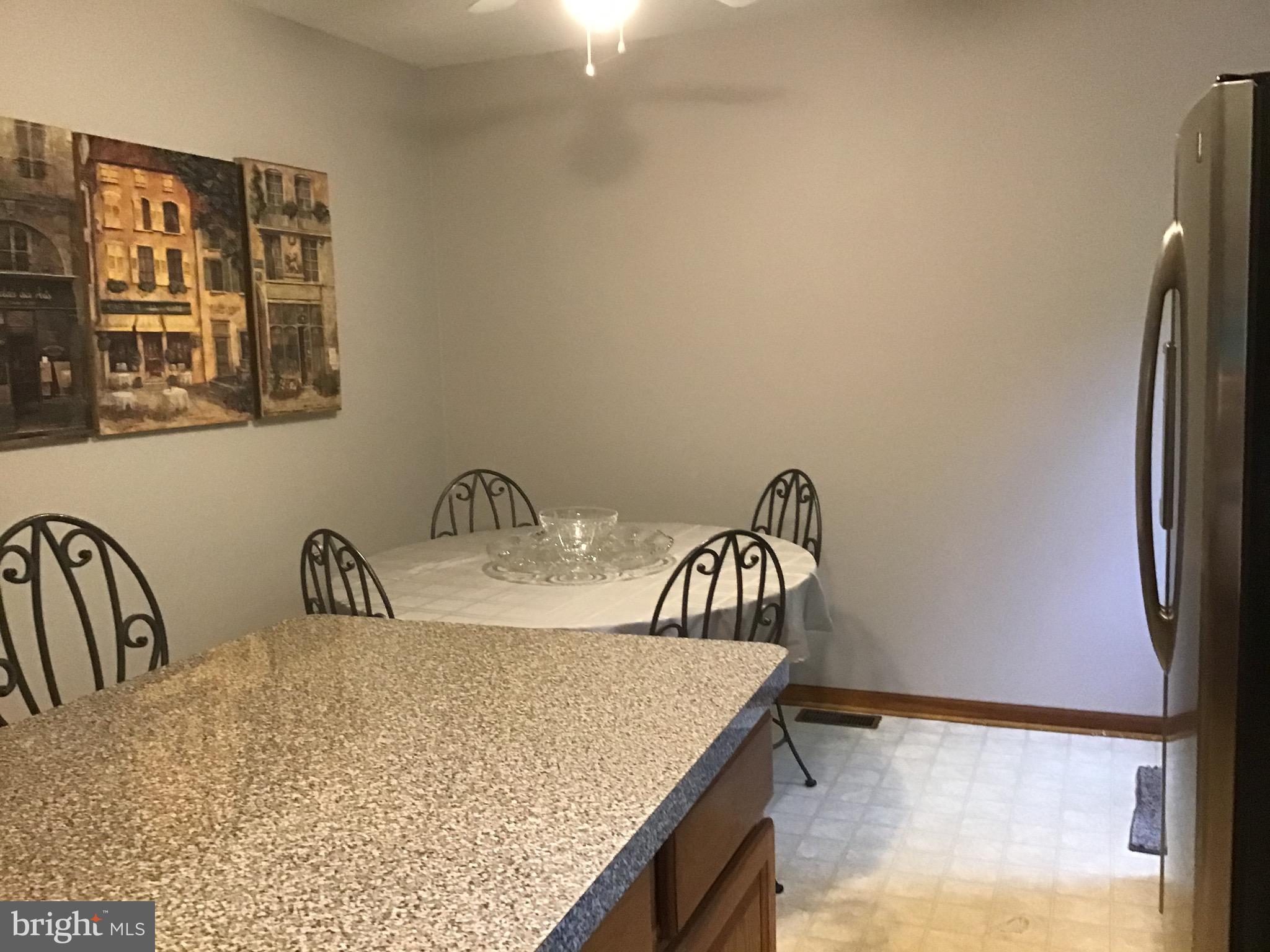 1503 Marshall Mill Road Franklinville, NJ 08322 - Photo 9 of 34 a bathroom with a granite countertop sink and a mirror