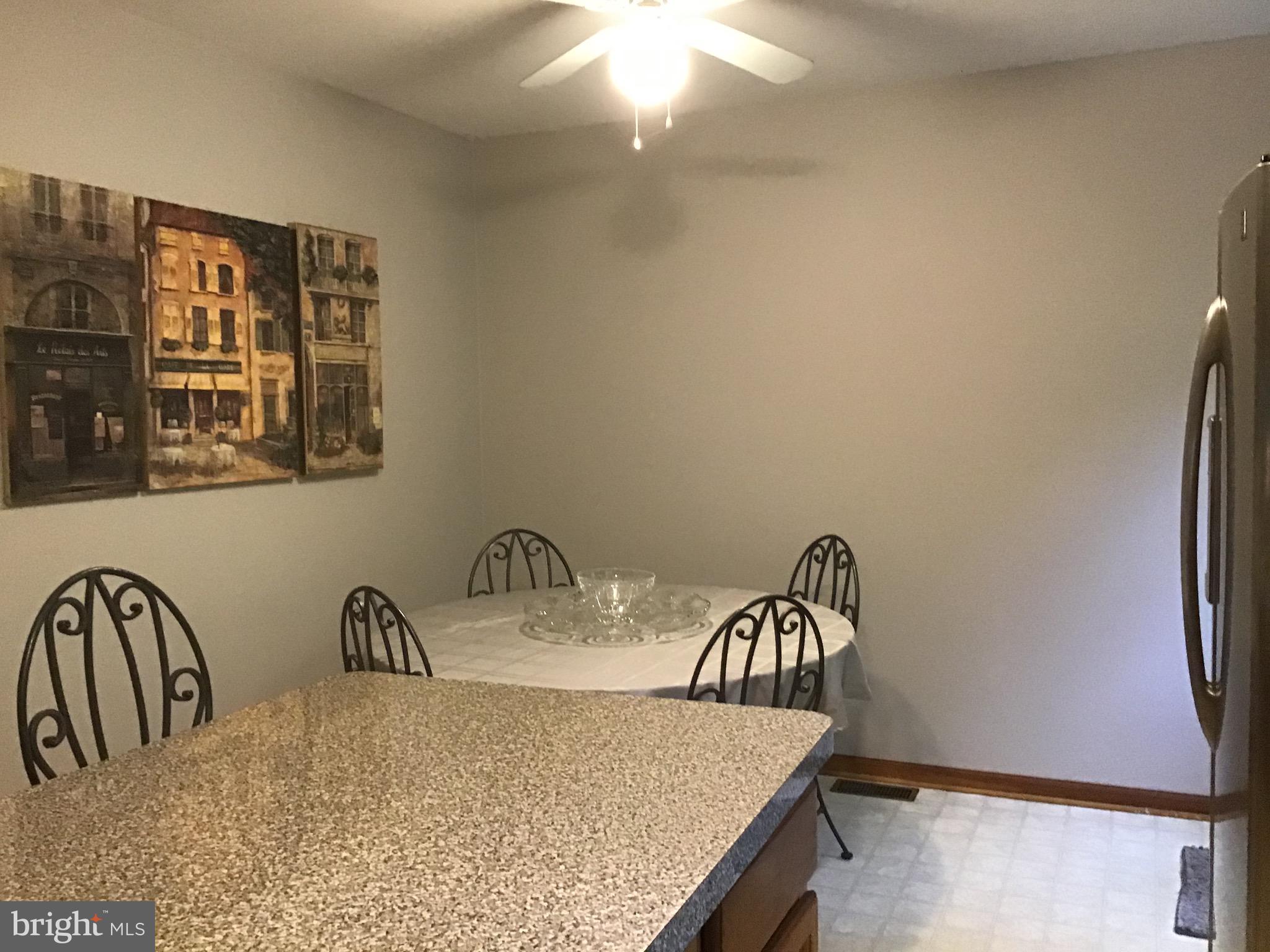 1503 Marshall Mill Road Franklinville, NJ 08322 - Photo 10 of 34 a bathroom with a granite countertop sink and a mirror
