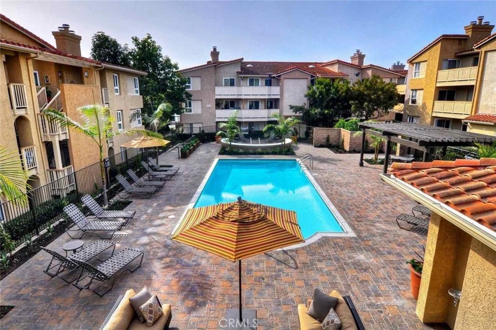 12 Corniche Drive, Unit A Dana Point, CA 92629 - Photo 15 of 26 a view of a backyard with furniture