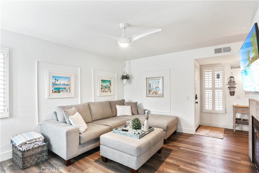 12 Corniche Drive, Unit A Dana Point, CA 92629 - Photo 5 of 26 a living room with furniture and a large window