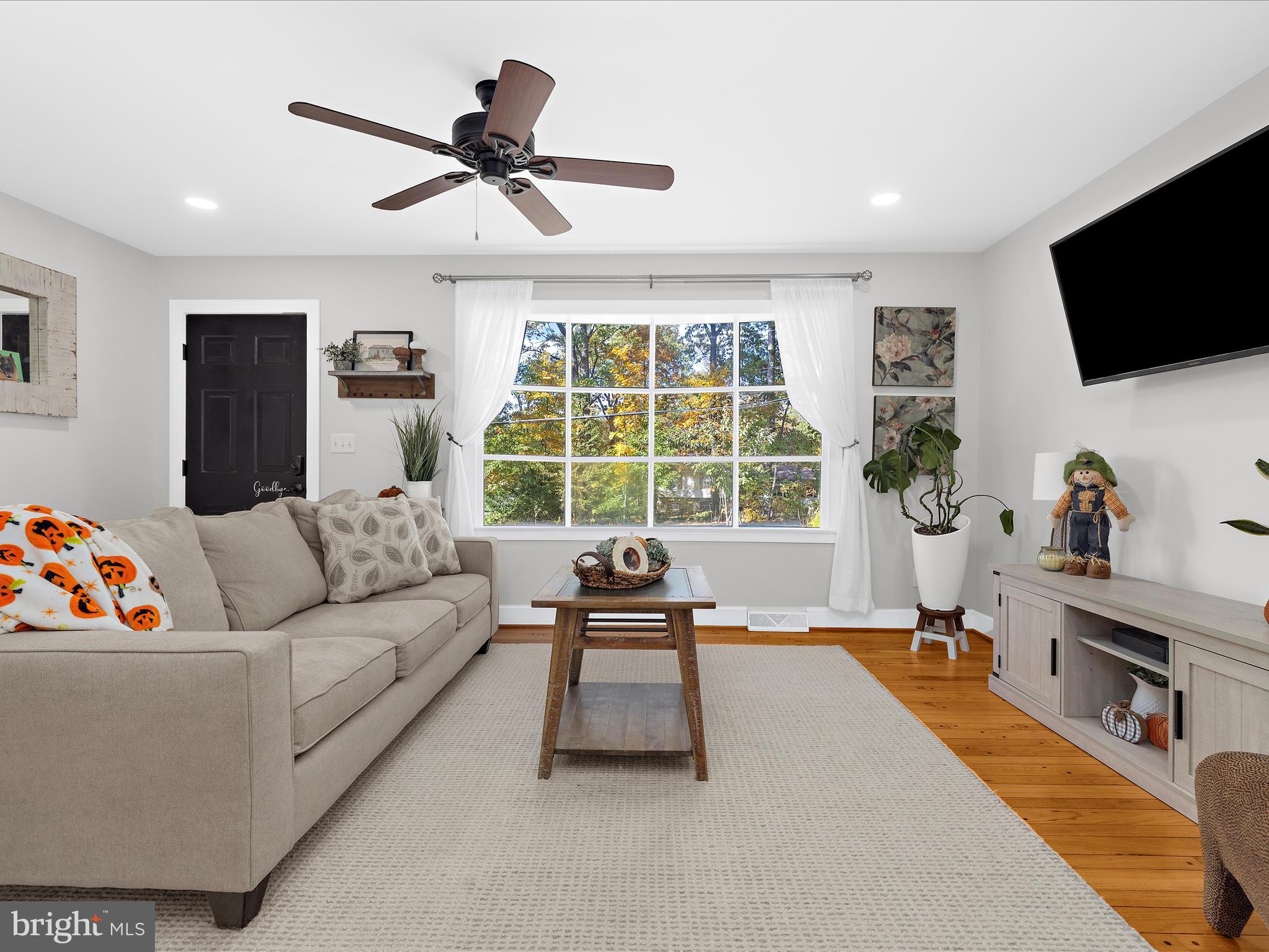11 Barnhart Road Westminster, MD 21158 - Photo 11 of 66 a living room with furniture and a flat screen tv