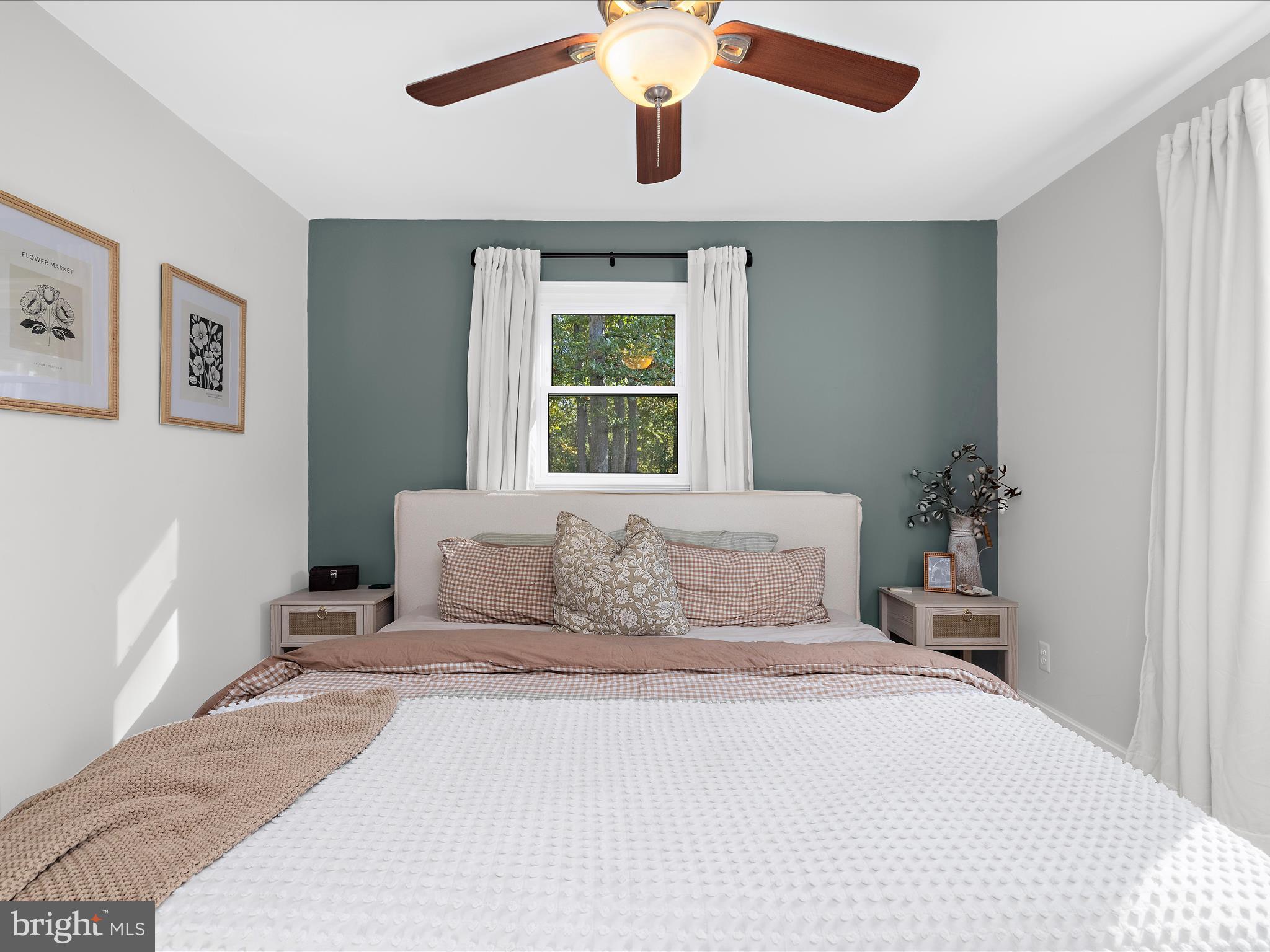 11 Barnhart Road Westminster, MD 21158 - Photo 19 of 66 a bedroom with a large bed and a window