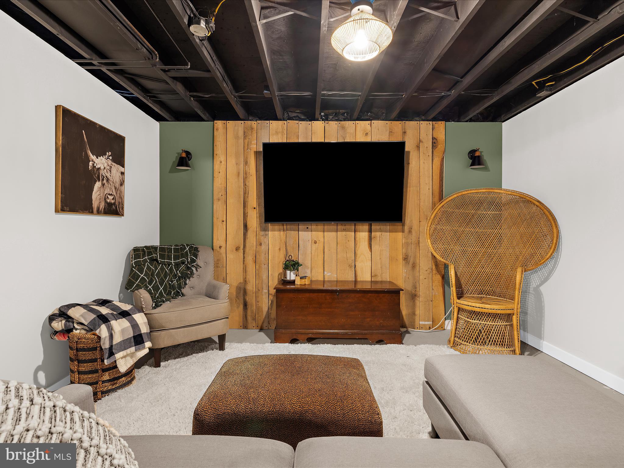 11 Barnhart Road Westminster, MD 21158 - Photo 25 of 66 a living room with furniture and a flat screen tv