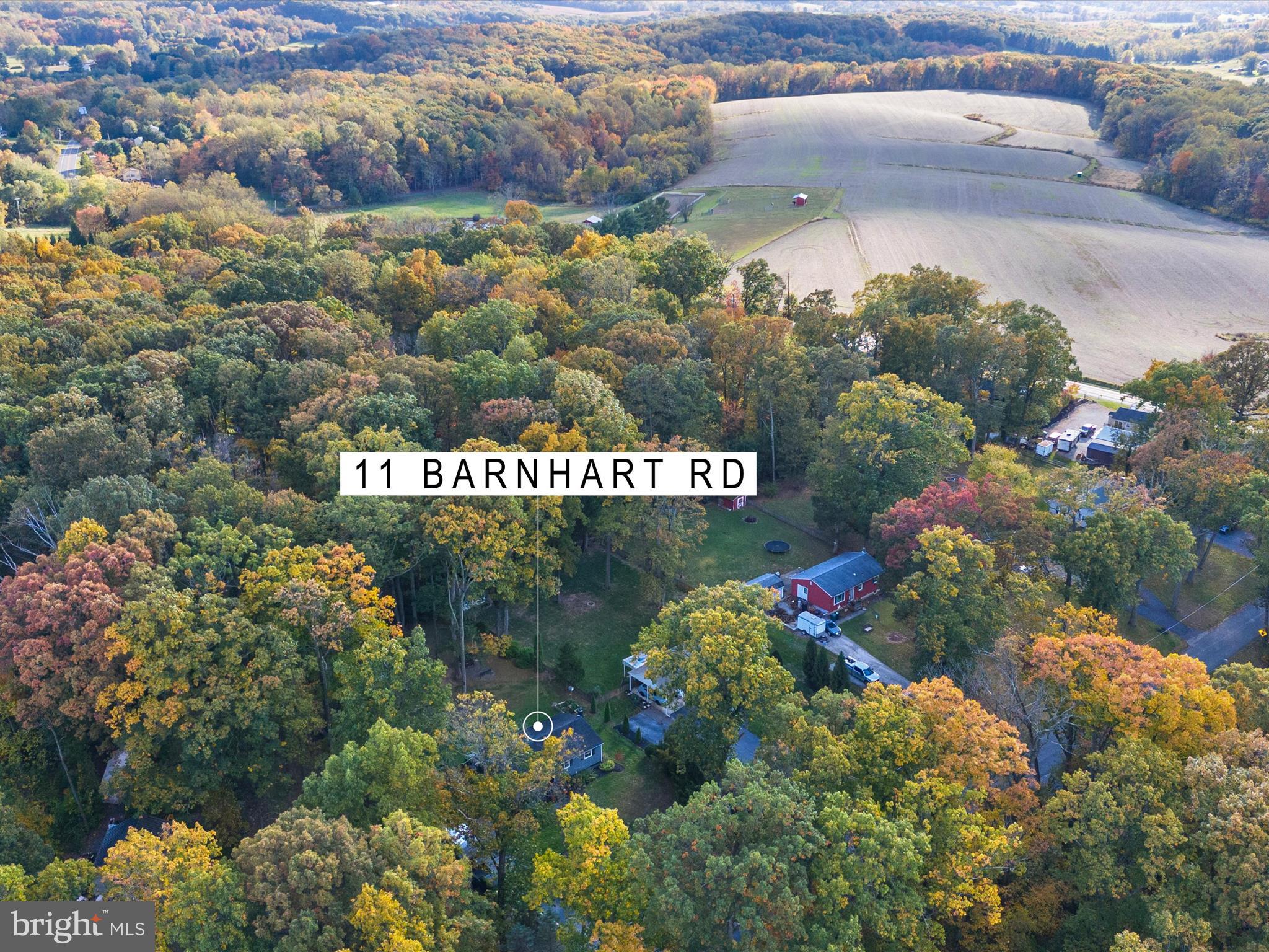 11 Barnhart Road Westminster, MD 21158 - Photo 61 of 66 a street sign with a lot of flowers in the background