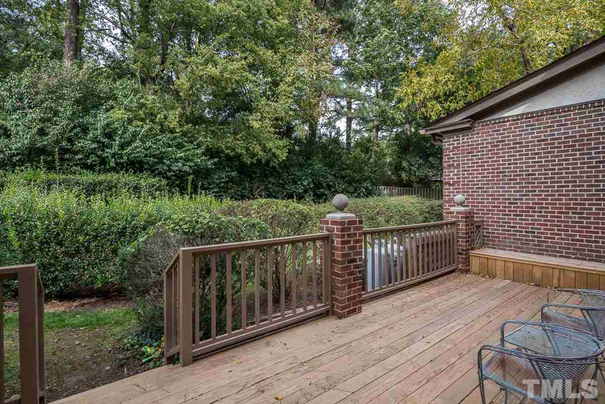 3302 Ridgecrest Court Raleigh, NC 27607 - Photo 19 of 23 a balcony with wooden floor and lake view