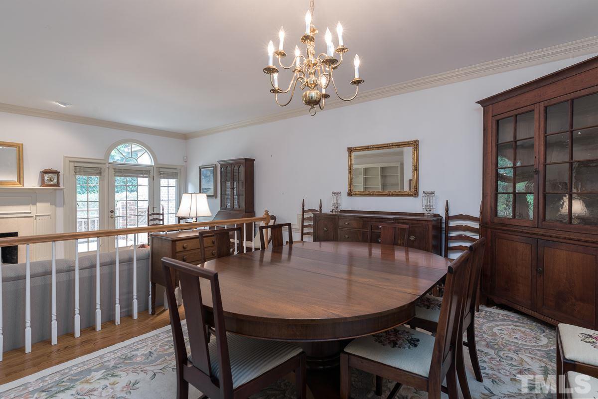 3302 Ridgecrest Court Raleigh, NC 27607 - Photo 7 of 23 a view of a dining room with furniture window and outside view
