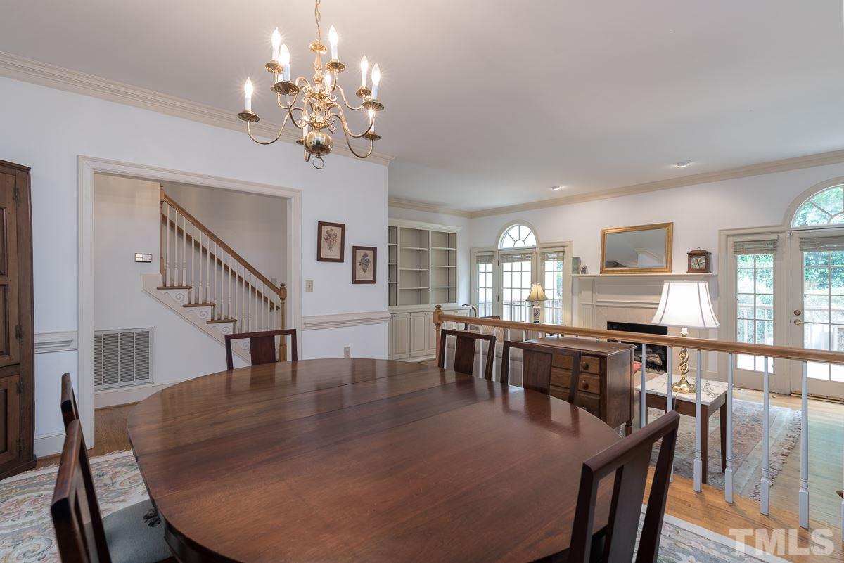 3302 Ridgecrest Court Raleigh, NC 27607 - Photo 8 of 23 a view of a dining room with furniture