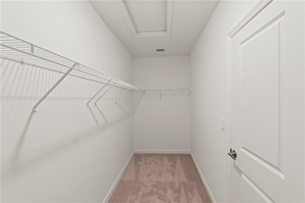 22036 Brookmont Drive Boca Raton, FL 33433 - Photo 13 of 32 a view of a room with racks on the wall