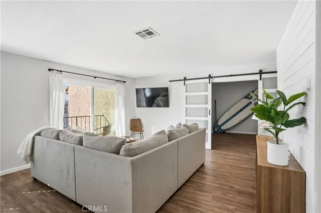 a view of a dining room with furniture and window