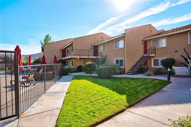 a view of a garden with statue