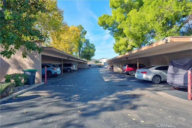 an aerial view of a houses with city view