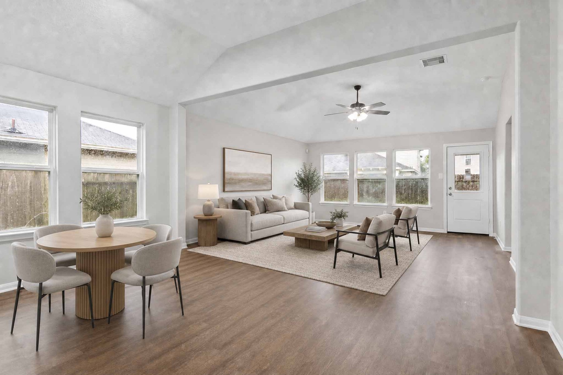 7811 Adonis Avenue Baytown, TX 77521 - Photo 10 of 36 a living room with furniture and a large window