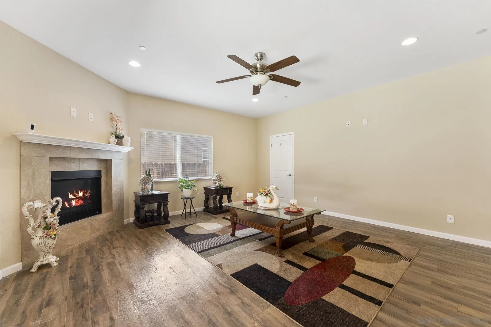 1637 Paraiso Avenue Spring Valley, CA 91977 - Photo 4 of 45 a living room with furniture and a fireplace