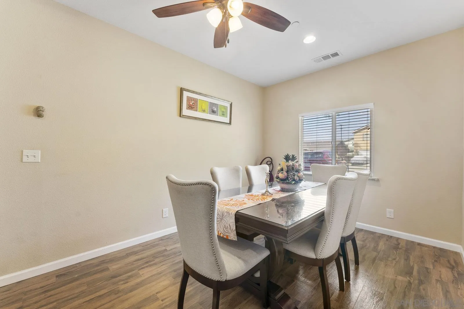 1637 Paraiso Avenue Spring Valley, CA 91977 - Photo 5 of 45 a view of a dining room with furniture and wooden floor